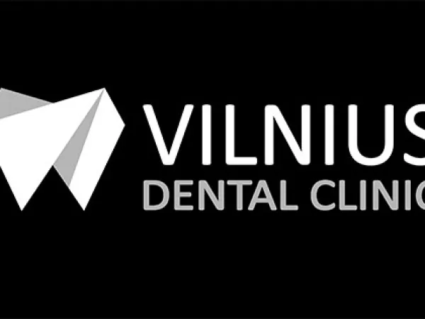 “Vilnius Dental Clinic” logo – on a dark background